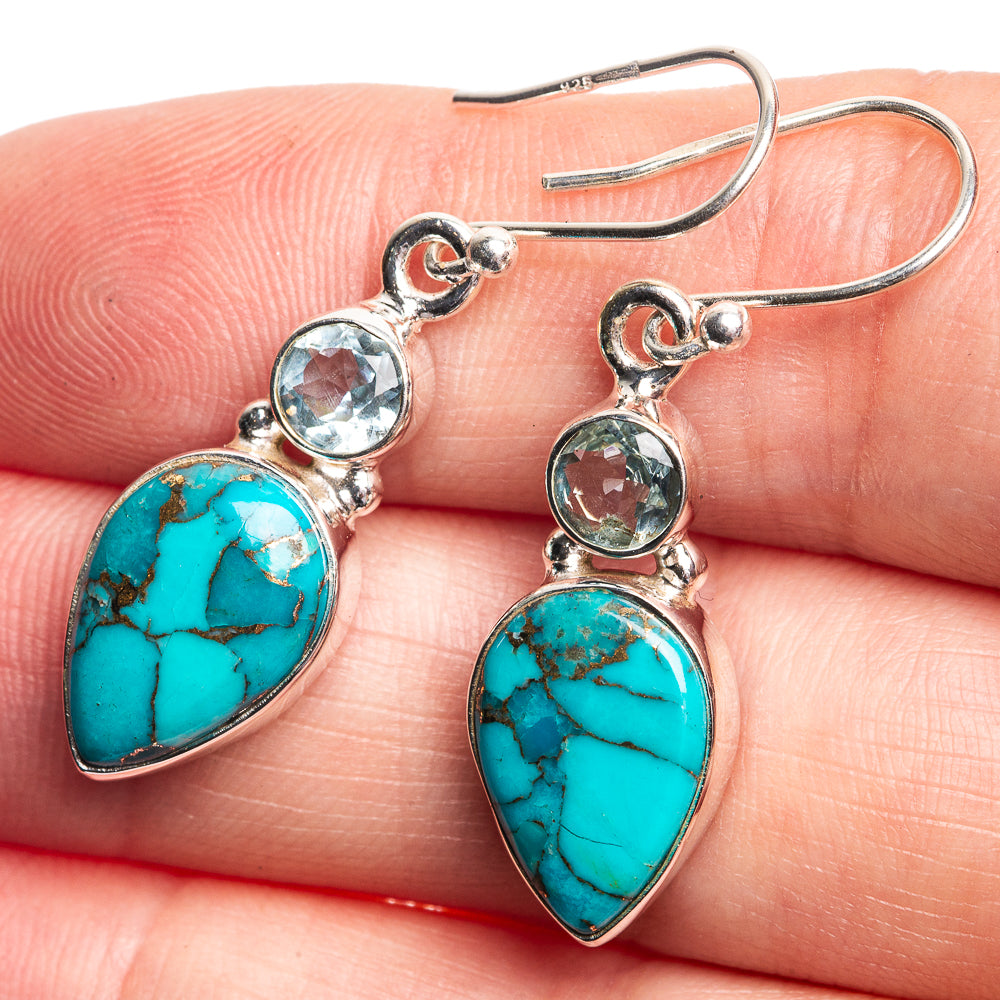 Sterling silver hook earrings with turquoise teardrops and round blue topaz stones
