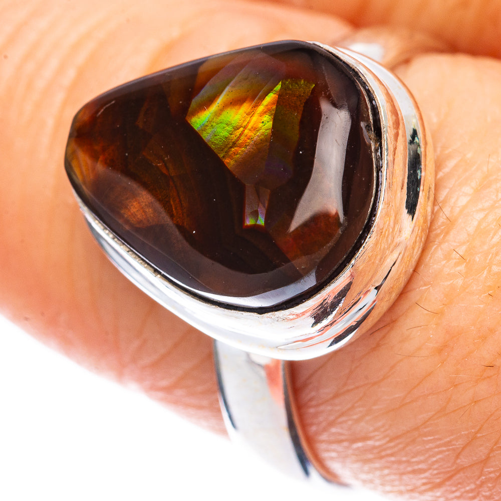 Sterling silver ring with teardrop fire agate, dark brown stone with rainbow iridescence