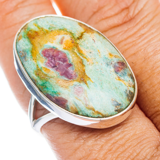 Oval turquoise gemstone ring in .925 sterling silver with purple and yellow matrix