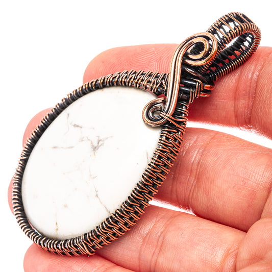 Howlite teardrop pendant detail, oxidized copper wrapped wire and loop bail