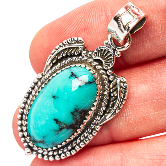 Kingman turquoise oval pendant in .925 sterling silver with ornate bead bezel