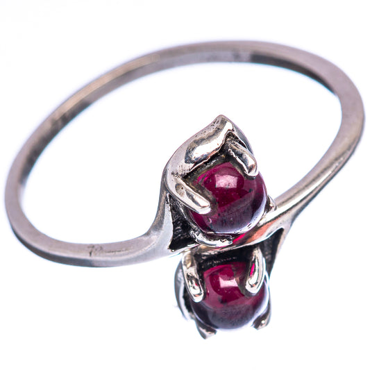 Sterling silver garnet ring with oval deep red gemstone, size 6, scalloped prongs