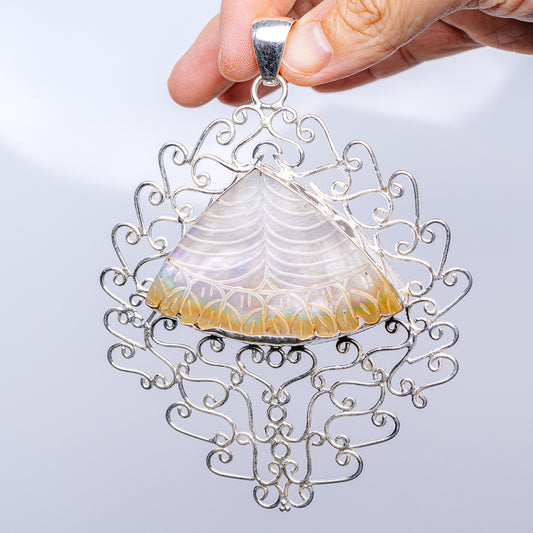 Mother of pearl pendant in .925 sterling silver filigree, teardrop with iridescent shell