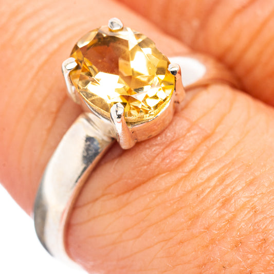 Sterling silver ring with large yellow citrine gemstone and four prong setting
