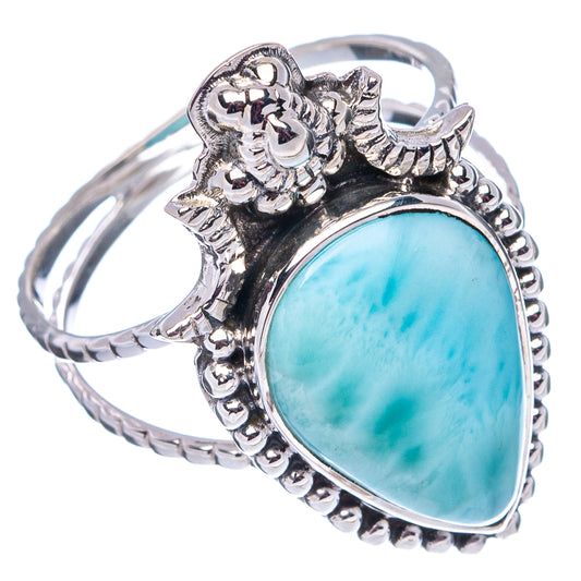 Sterling silver larimar ring with oval light-blue cabochon, sculpted top, bead band