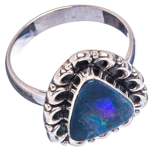 Sterling silver opal doublet ring with ornate filigree and triangular blue stone