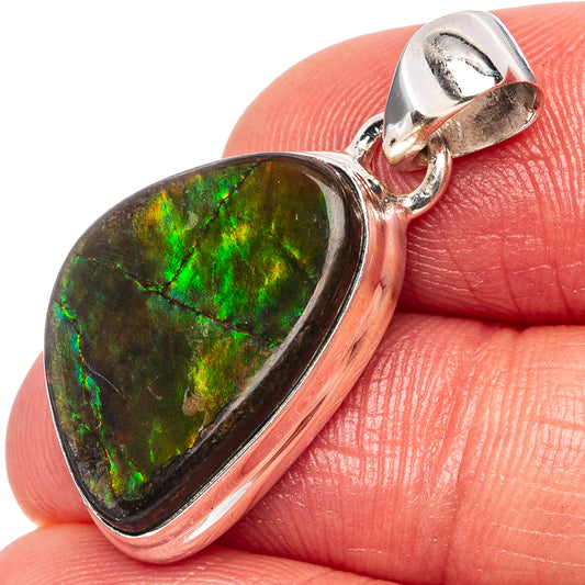 Oval ammolite cabochon pendant in .925 sterling silver bezel