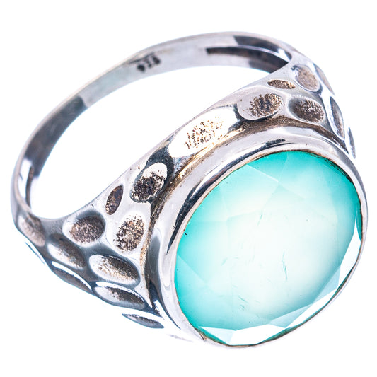 Sterling silver ring with faceted aqua chalcedony oval set in textured band, size 7.5