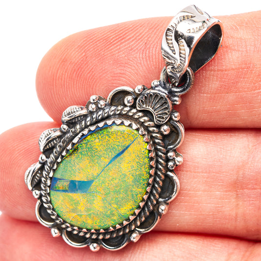 Native Style sterling silver opal pendant with ornate rope border and drop bail