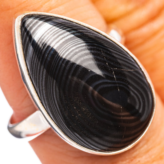 Sterling silver ring with teardrop psilomelane cabochon, black striped stone bezel