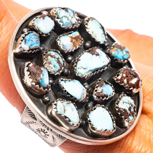 Turquoise oval cluster ring with bezel-set stones on dark silver; adjustable .925 sterling