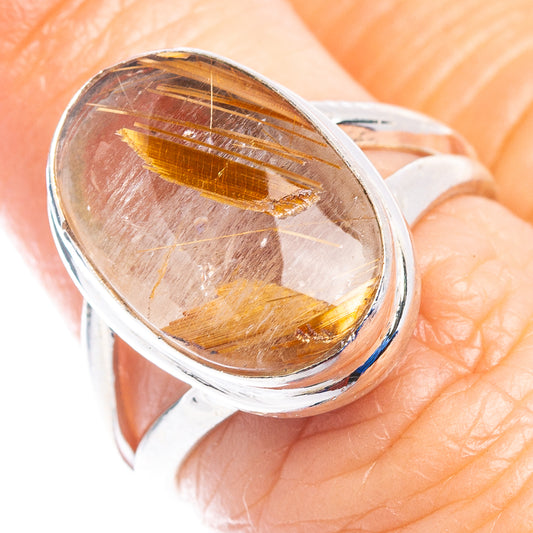 Oval star rutilated quartz ring in polished .925 sterling silver band