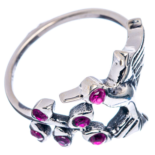 Sterling silver hummingbird ring with pink cubic zirconia stones, side view