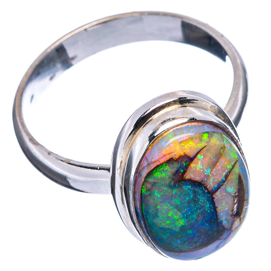 Oval opal bezel sterling silver ring with vivid blue, green, and orange flashes