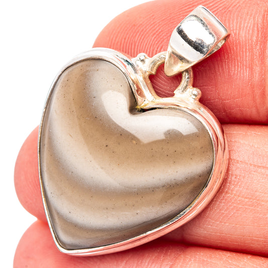 Heart flint pendant in .925 sterling silver bezel, polished silver bail