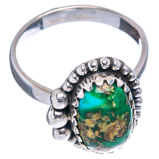 Sterling silver turquoise oval ring with beaded bezel and scalloped band details