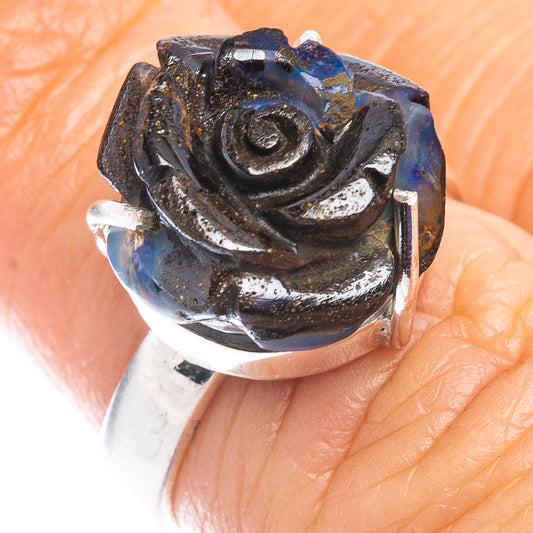 Sterling silver ring with dark blue opal rose centerpiece on band
