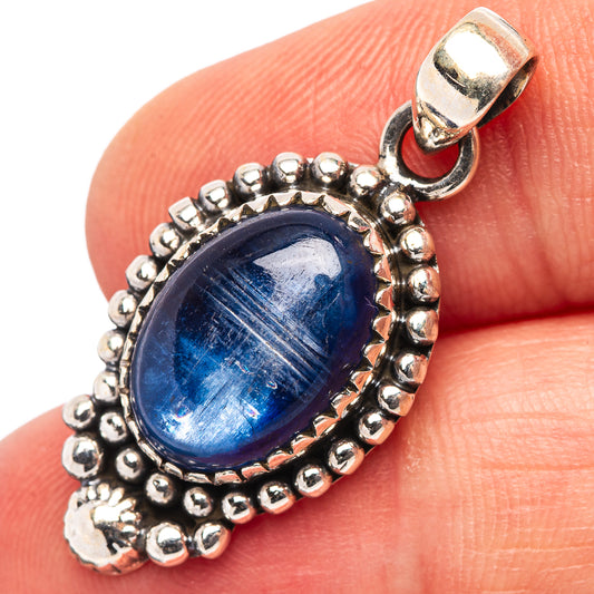 Oval kyanite pendant in .925 sterling silver with beaded edge and loop bail, blue stone.