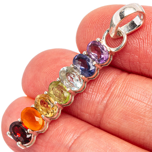 Sterling silver chakra pendant with multicolor bezel-set stones and loop bail