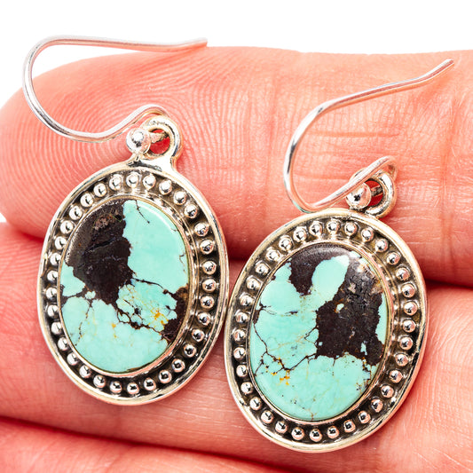 Turquoise oval drop earrings in .925 sterling silver with beaded bezel and hook backs