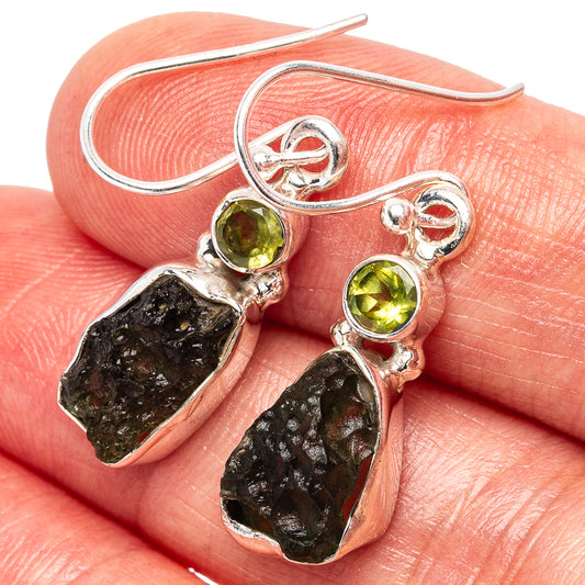 Sterling silver moldavite earrings with dark rough stones and round green accents, fishhook