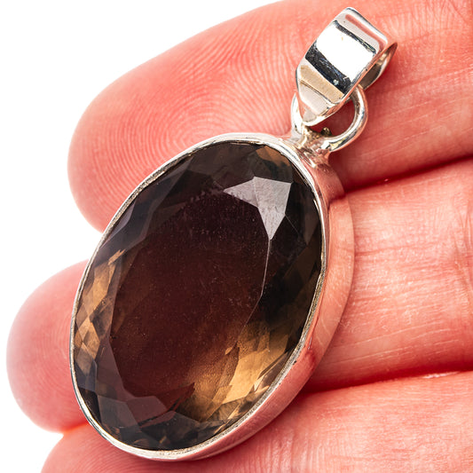 Oval smoky quartz pendant in .925 sterling silver, with rectangular bail