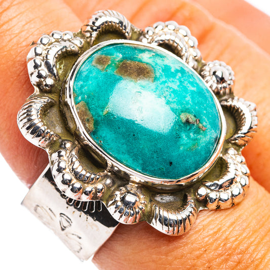 Turquoise oval cabochon sterling silver ring on finger, detailed rope and beadwork band