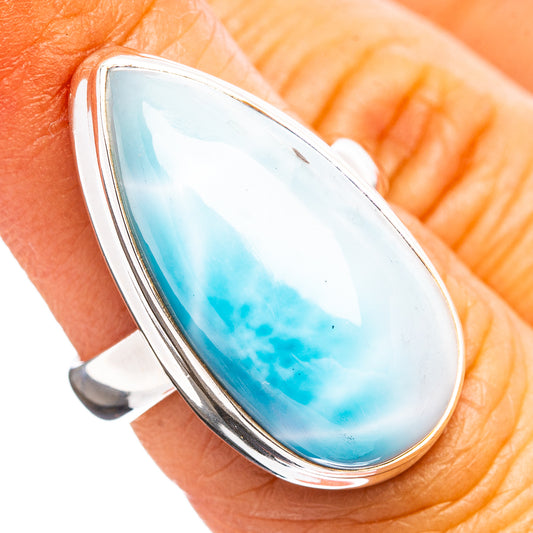 Silver ring with oval light blue Larimar gemstone bezel setting