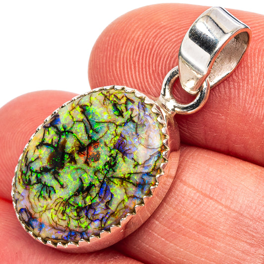 Sterling silver opal pendant with oval iridescent multicolor stone and top loop