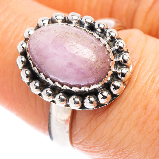Oval purple-pink gemstone ring in sterling silver with beaded bezel halo