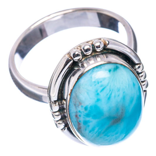 Sterling silver ring with oval sky-blue Larimar gemstone, openwork bead setting