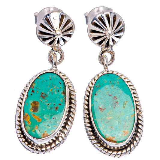 Sterling silver turquoise oval drop earrings with textured bezels and dangling hooks