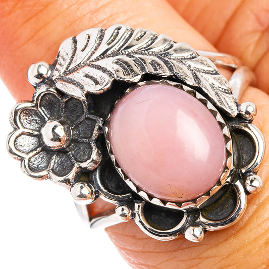 Sterling silver pink opal ring with oval cabochon and floral leaf detail, size 6.75