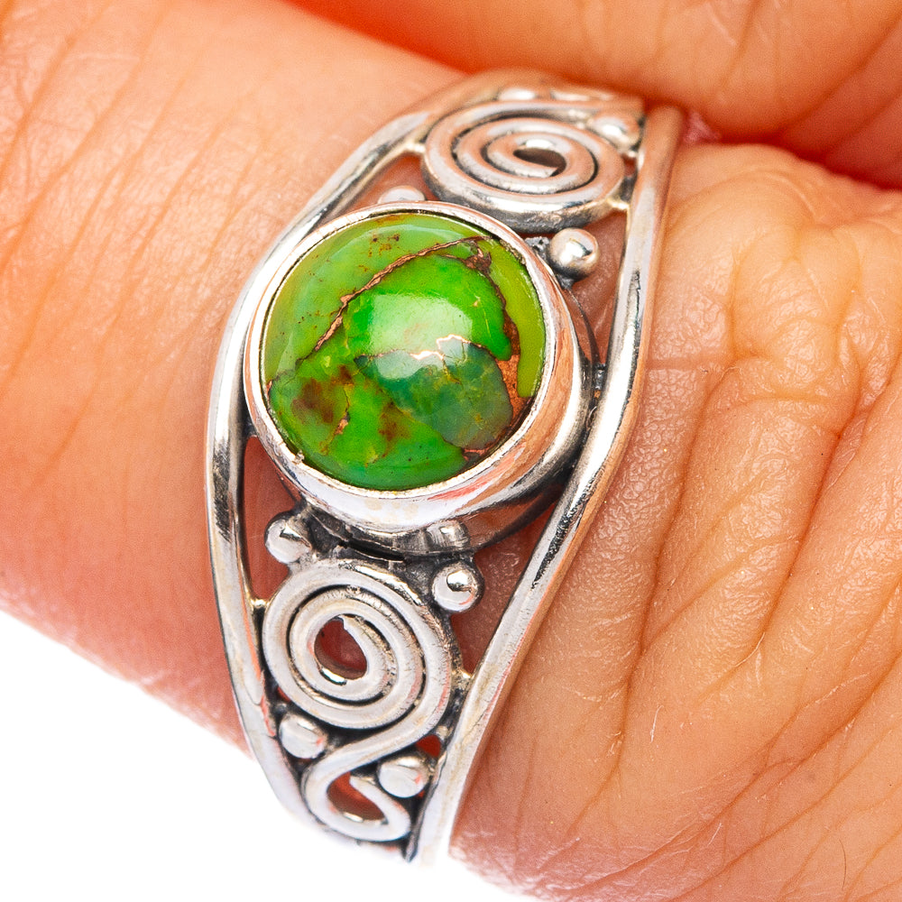 Sterling silver dainty ring with green oval turquoise cabochon and spiral scrollwork