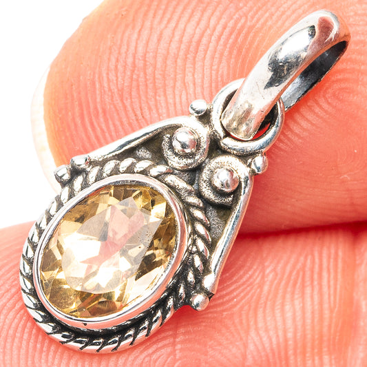 Citrine oval pendant in .925 sterling silver with ornate bezel and side details