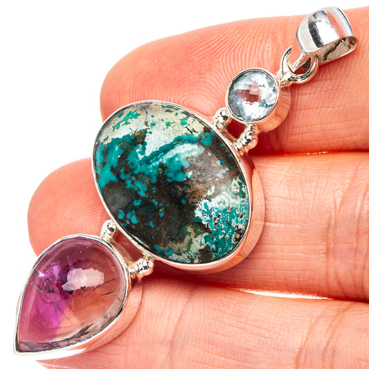 Sterling silver oval turquoise cabochon pendant with purple and blue gemstones