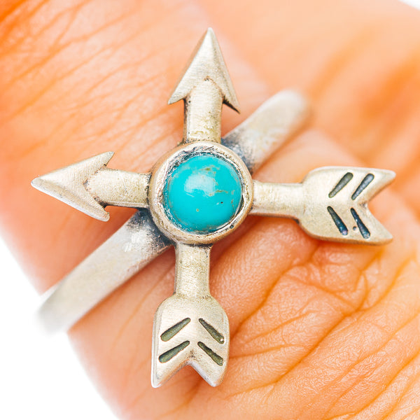 Sterling silver arrow ring with round turquoise cabochon and four arrowhead accents