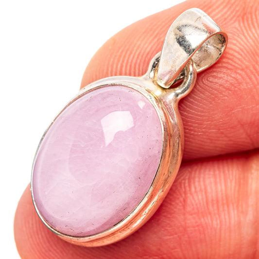 Kunzite gemstone pendant with pink oval stone, sterling silver bezel, open bail
