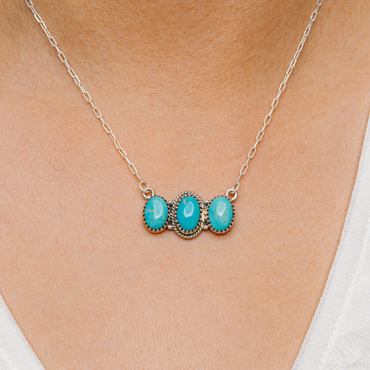 Turquoise bead pendant necklace with three oval stones on sterling silver chain