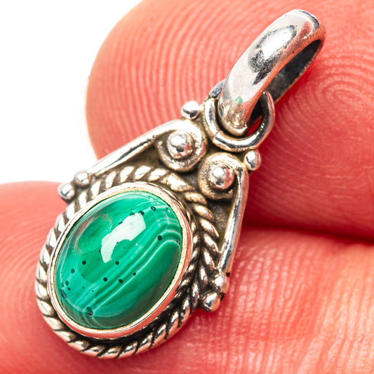 .925 sterling silver malachite pendant with oval green stone and ornate frame