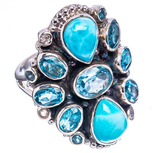 Sterling silver ring with large oval blue Larimar-style center and blue topaz side stones.
