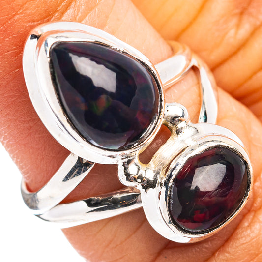 Oval black opal double-stone ring in polished .925 sterling silver, size 5.75