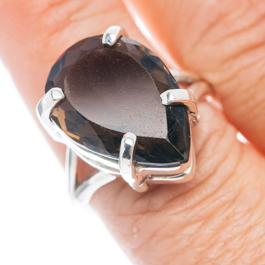 Smoky quartz oval ring in .925 sterling silver with four-prong bezel setting