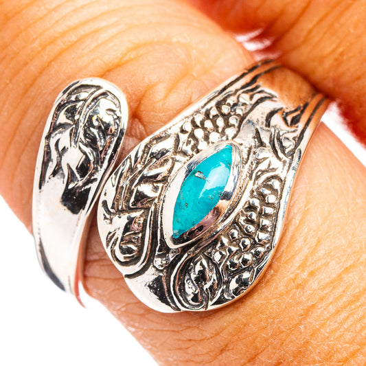 Turquoise oval sterling silver ring with engraved side detailing