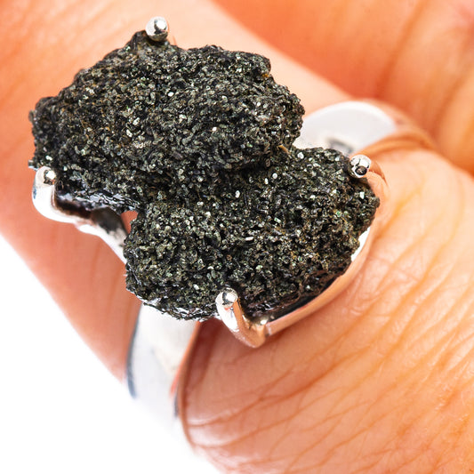 Sterling silver ring with rough dark druzy stone, open claw prongs