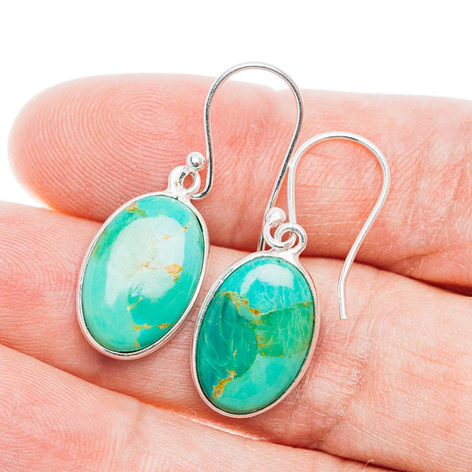 Turquoise oval drop earrings in .925 sterling silver with oval stone