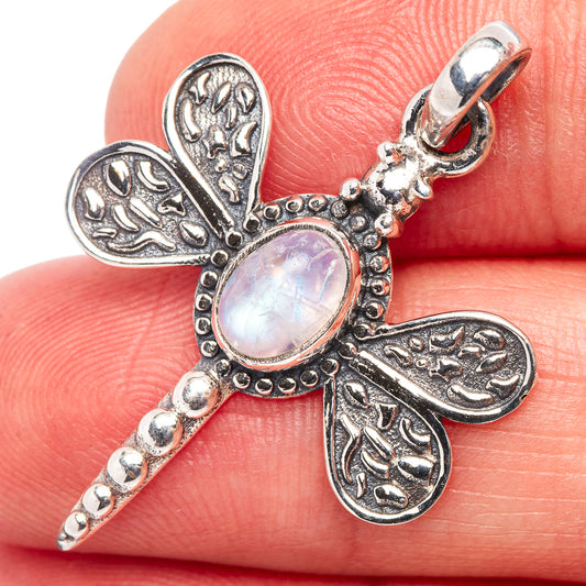 Sterling silver dragonfly pendant with oval moonstone center and bead-detail body