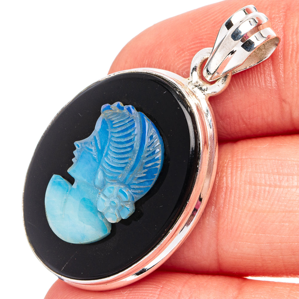 Sterling silver onyx cameo pendant with blue engraved figure in round black setting