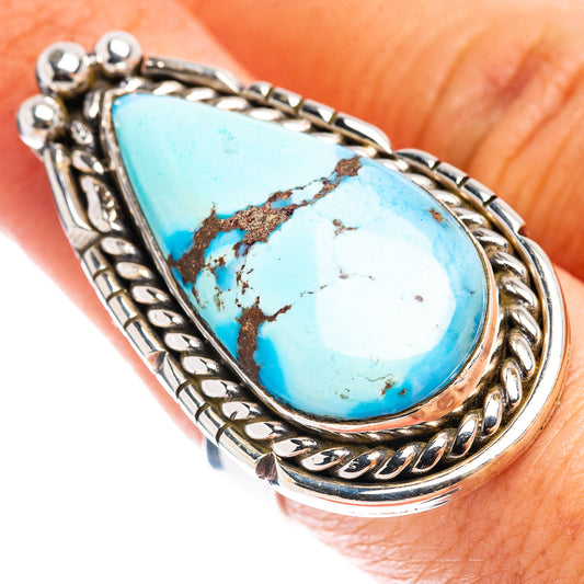 Turquoise teardrop cabochon ring with braided silver bezel and chainlike band
