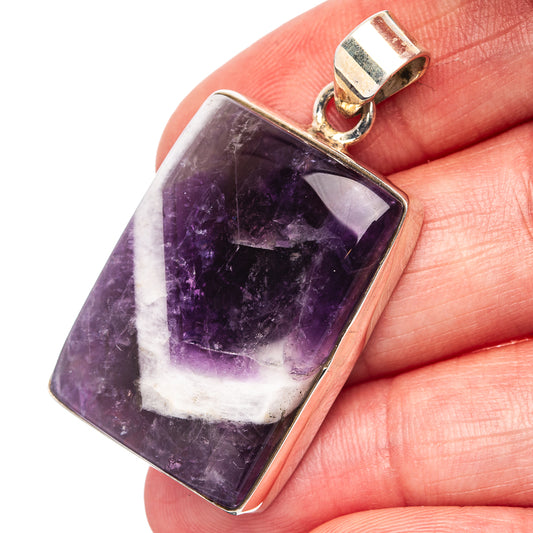 Rectangular amethyst pendant in .925 sterling silver with round bail and deep purple stone
